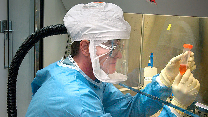 scientist working with fume hood
