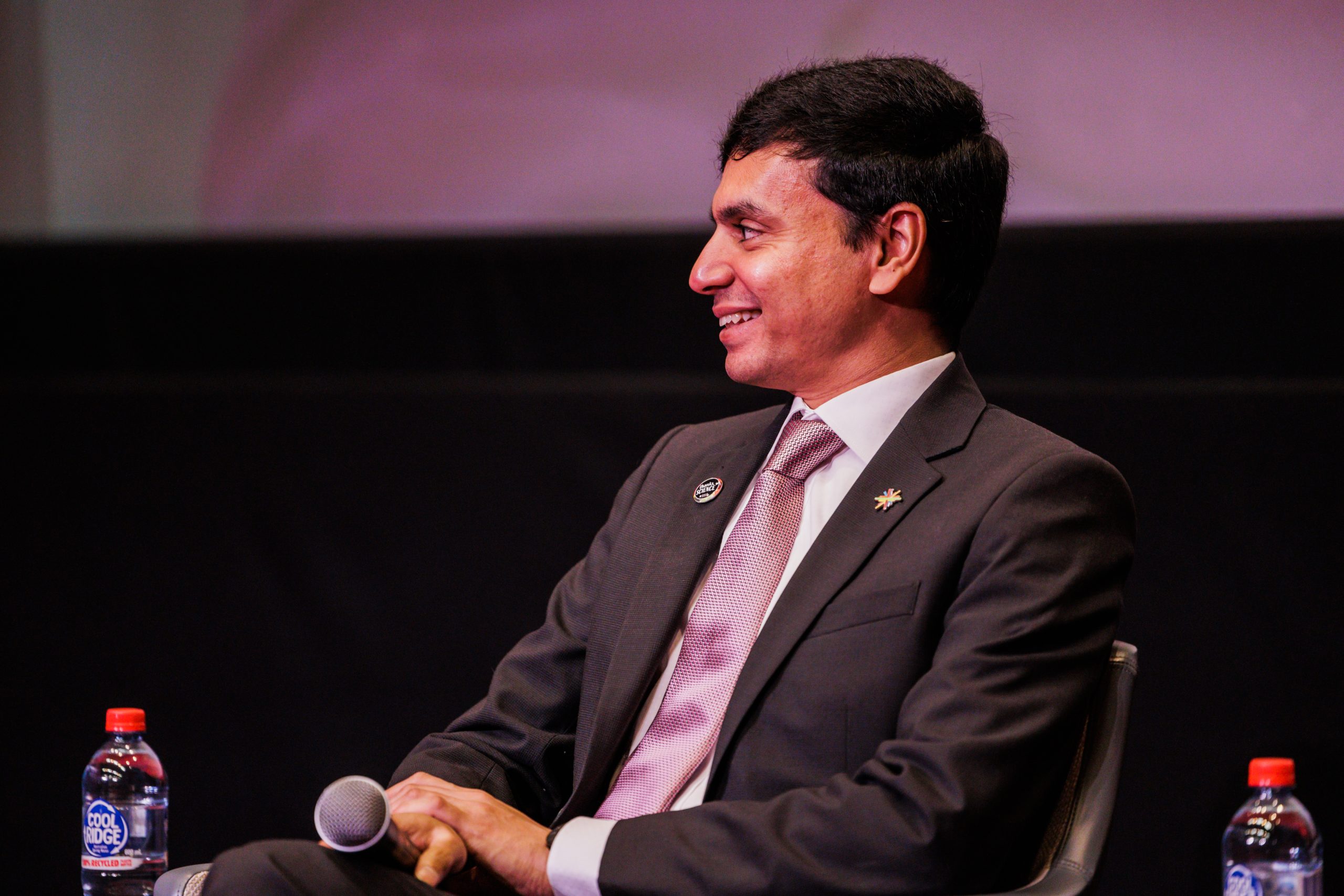 Sharath Sriram – STA's new President – onstage at Science Meets Parliament 2023.